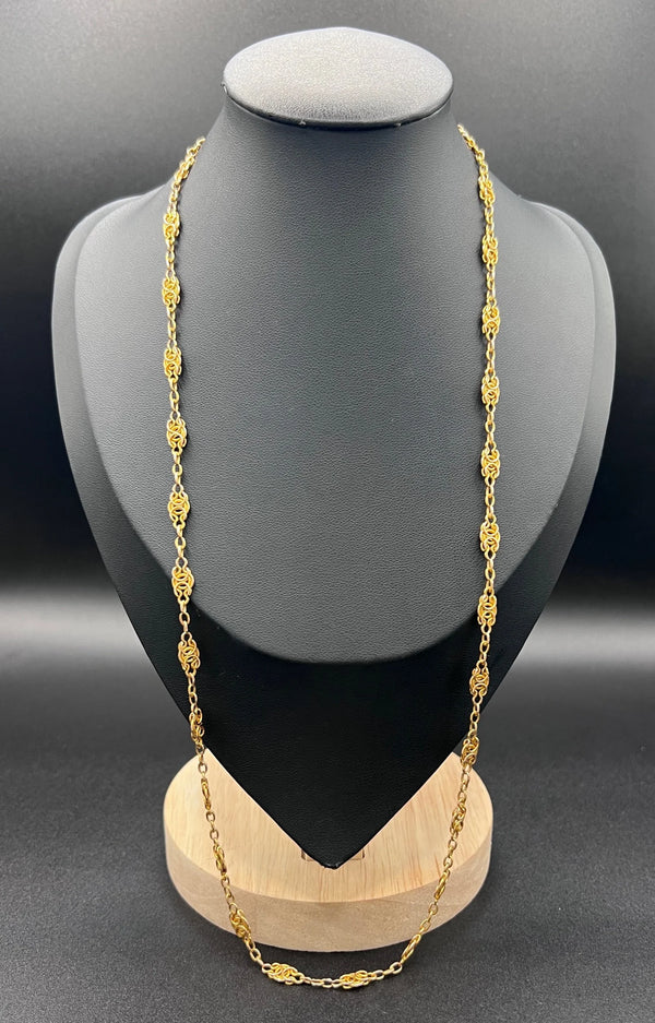 A yellow gold fancy link chain necklace