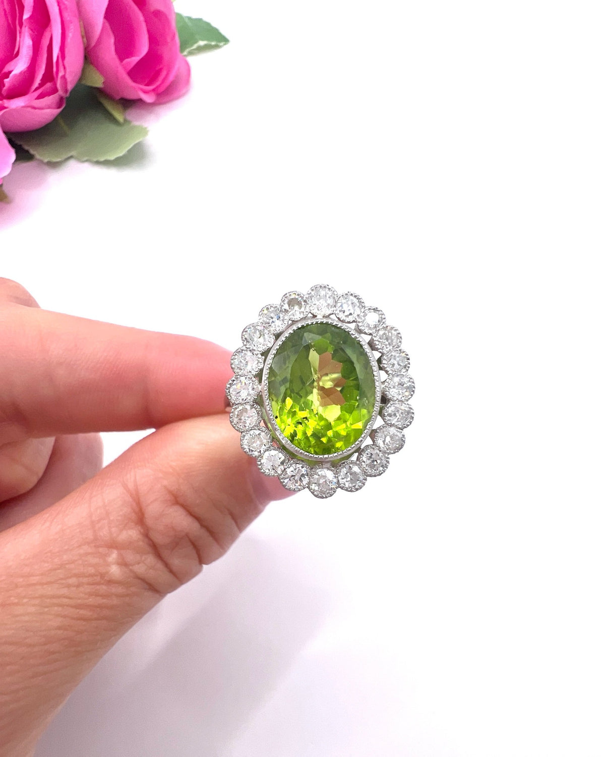 Antique French Platinum Peridot and Diamond Halo Cluster Ring, Circa 1910
