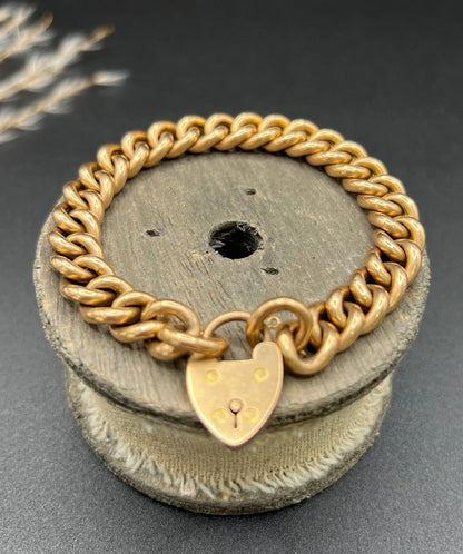 Victorian 15 Carat Rose Gold Curb Link Bracelet with Heart Padlock Clasp, Circa 1880