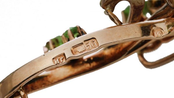 Antique Russian Demantoid Garnet Brooch Pendant in 14ct Rose Gold; featuring a stunning array of rose-cut demantoid garnets arranged in a delicate floral pattern, 19th century, Circa 1890