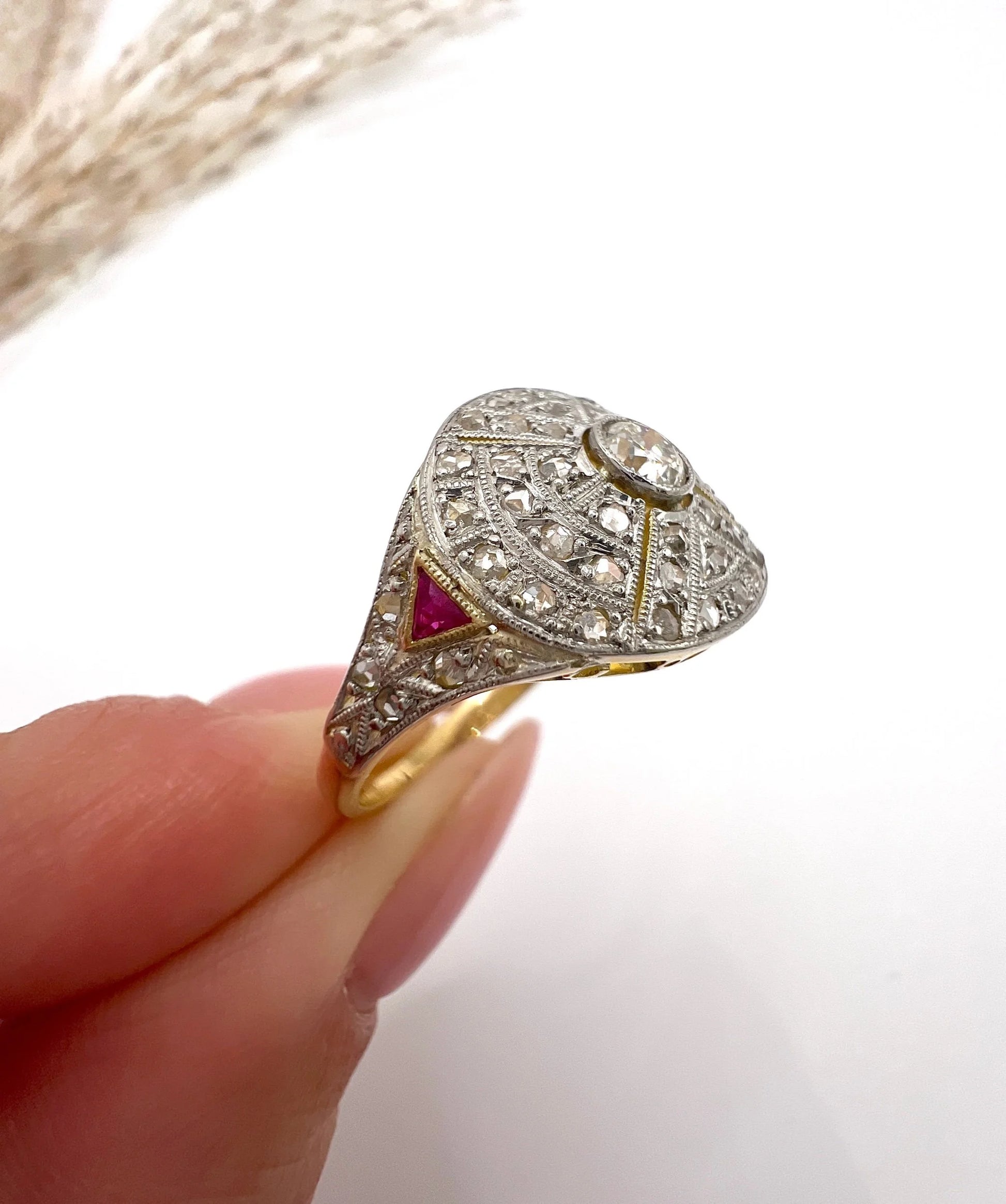 Antique 18 Carat Gold, Platinum, Diamond and Ruby Bombé Ring, Circa 1910