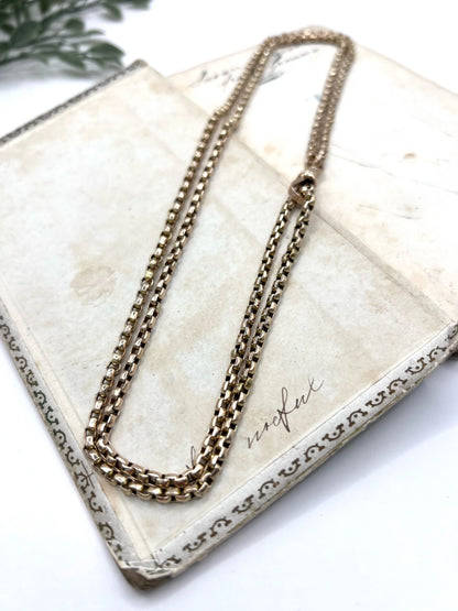 A long rose gold link necklace with swivel clasp