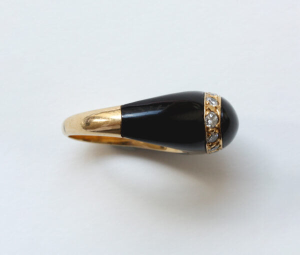 Van Cleef and Arpels Onyx, Diamond and 18ct Yellow Gold Fidji Ring; Signed and numbered Van Cleef & Arpels, Model Fidji, 0.51 carat total.