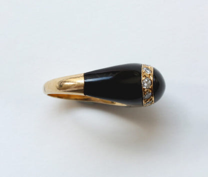 Van Cleef and Arpels Onyx, Diamond and 18ct Yellow Gold Fidji Ring; Signed and numbered Van Cleef & Arpels, Model Fidji, 0.51 carat total.
