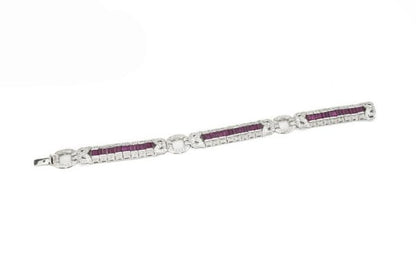Vintage Ruby and Diamond Bracelet, 2.40cts baguette-cut rubies surrounded by 2.71cts diamonds, diamond set circular links, Circa 1990's.