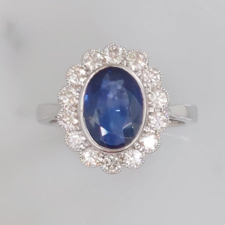 2.57ct Oval Sapphire and Diamond Floral Cluster Engagement Ring