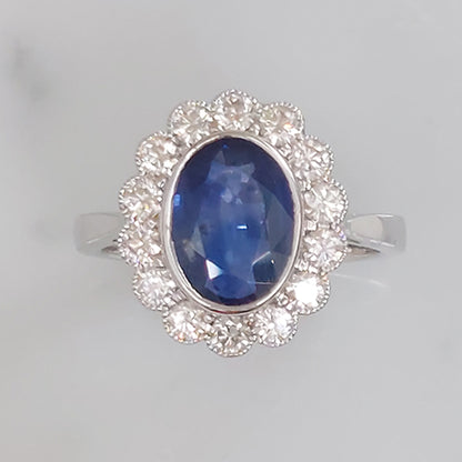 2.57ct Oval Sapphire and Diamond Floral Cluster Engagement Ring
