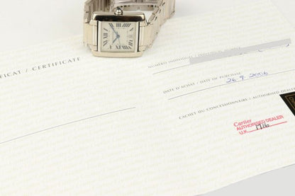 Cartier Gents Tank Française 18ct White Gold 28mm Automatic Rectangular Watch, silver guilloche dial, black Roman numerals, date aperture at 6, sapphire crystal glass, cabochon blue gem set crown, on Cartier 18ct bracelet with hidden double deployment clasp. With Cartier booklet and certificate dated 2006.