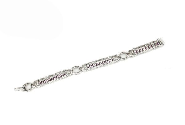 Vintage Ruby and Diamond Bracelet, 2.40cts baguette-cut rubies surrounded by 2.71cts diamonds, diamond set circular links, Circa 1990's.