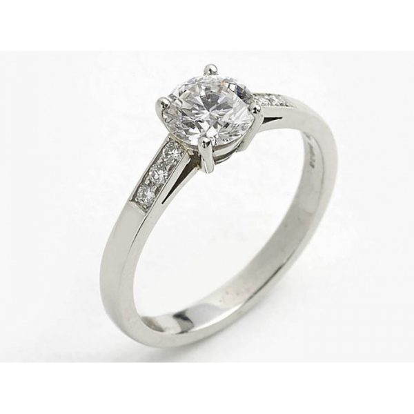 1.04ct Brilliant Cut Diamond Solitaire Engagement Ring; GIA certified F VS1 1.04 carat round brilliant-cut diamond, with diamond set shoulders, mounted in platinum