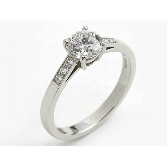 1.04ct Brilliant Cut Diamond Solitaire Engagement Ring; GIA certified F VS1 1.04 carat round brilliant-cut diamond, with diamond set shoulders, mounted in platinum