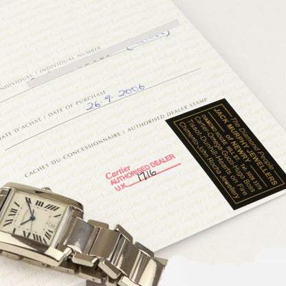 Cartier Gents Tank Française 18ct White Gold 28mm Automatic Rectangular Watch, silver guilloche dial, black Roman numerals, date aperture at 6, sapphire crystal glass, cabochon blue gem set crown, on Cartier 18ct bracelet with hidden double deployment clasp. With Cartier booklet and certificate dated 2006.