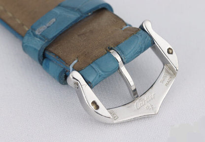 Cartier Tank Americaine Midsize 18ct White Gold 1726 Automatic, white guilloche dial, Roman numerals, blue steel hands, date indicator, sapphire crown, sapphire crystal, On a Cartier light blue strap with 18ct white gold buckle.