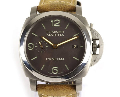 Panerai Luminor Marina Titanium 44mm Automatic; black dial, subsidiary seconds dial, date aperture at 3 o'clock, sapphire crystal glass, with luminous hands and Arabic/baton hour markers, on Panerai light brown leather strap with titanium buckle, with Panerai box and paperwork