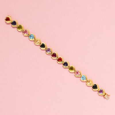 Contemporary Multi Gemstone Heart Link Bracelet in 18ct Yellow Gold, set with amethyst, green tourmaline, citrine, blue tourmaline, pink tourmaline, peridot, iolite and almandine garnet