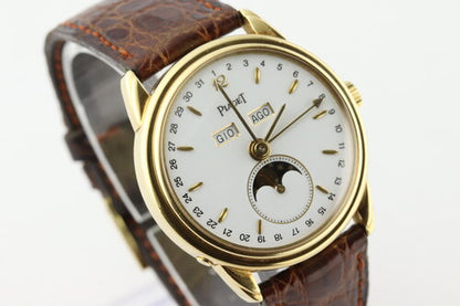 Piaget Triple Calendar Moon Phase 18ct Yellow Gold Limited Edition 33mm Watch, white dial, on brown leather strap with 18ct gold Piaget buckle. Ref. 15908, with Papers