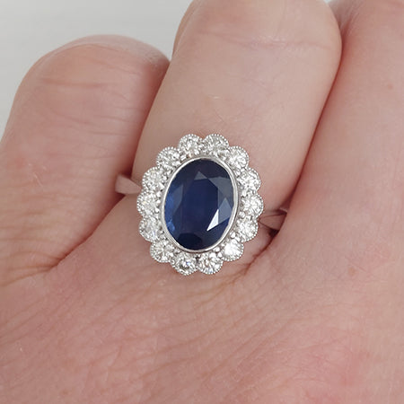 2.57ct Sapphire and Diamond Oval Cluster Engagement Ring