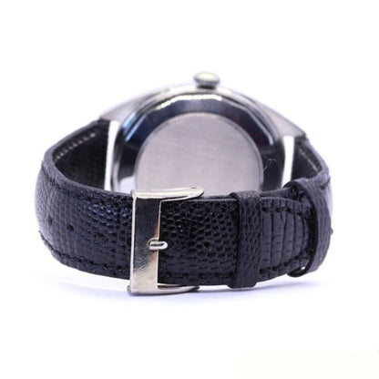 Vintage IWC 36mm Stainless Steel Automatic Watch; round dark grey dial with baton hour markers, date aperture at 3, luminous hands, plexiglass crystal, screw-down case-back, on a black leather strap with steel buckle, Circa 1970s