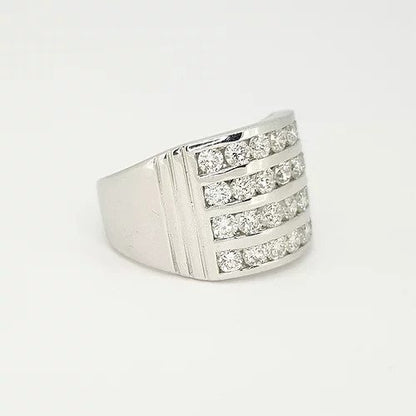 Channel Set Diamond Dress Ring; featuring four horizontal rows channel set with 2.00 carats brilliant cut diamonds, ribbed shoulders, in 18ct white gold