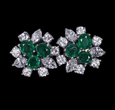 Vintage 1950s Emerald and Marquise Diamond Cluster Stud Earrings; each earring features three oval emeralds surrounded by marquise and brilliant cut diamonds, in platinum. Emeralds 1.00 carat. Diamonds 2.10 carats