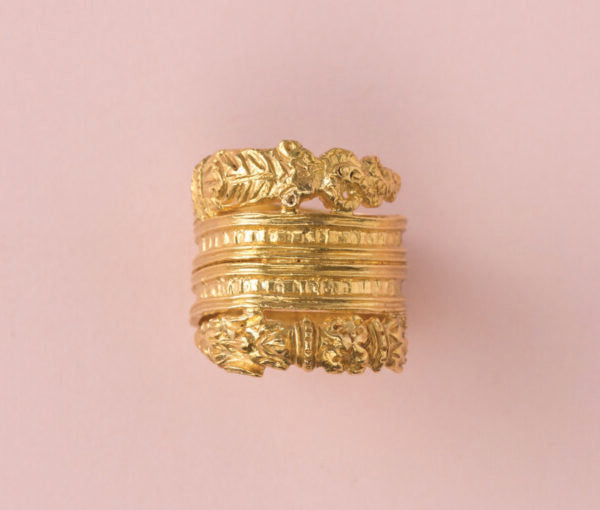 Antique Scandinavian Gold Dragon Ring; striking high-carat gold ring with spiralling bands, tips decorated with a dragon’s head on one end and a meandering tail on the other end