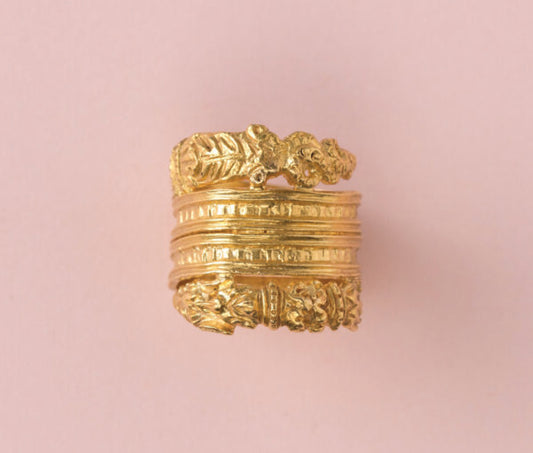 Antique Scandinavian Gold Dragon Ring; striking high-carat gold ring with spiralling bands, tips decorated with a dragon’s head on one end and a meandering tail on the other end