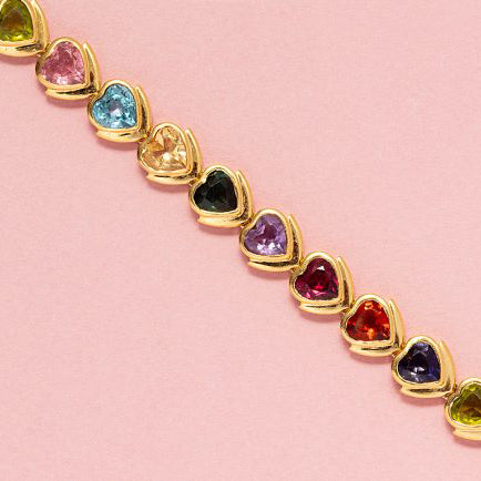 Modern Multi Gemstone Heart Link Bracelet in 18ct Yellow Gold, set with amethyst, green tourmaline, citrine, blue tourmaline, pink tourmaline, peridot, iolite and almandine garnet