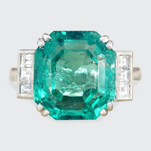 Certified 6.19ct Octagonal Cut Colombian Emerald and Princess Cut Diamond Ring in Platinum with GCS certificate