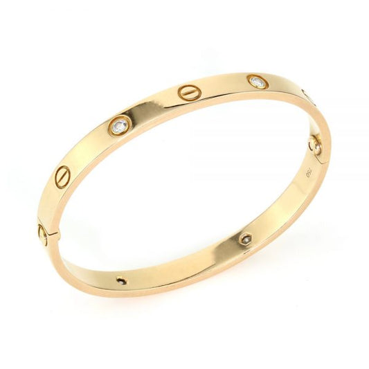 Cartier 18ct Rose Gold Love Bangle Bracelet set with four brilliant cut diamonds, Circa 2000s. Comes with Cartier box, gold screwdriver and certificate / insurance valuation from Cartier in Harrods London