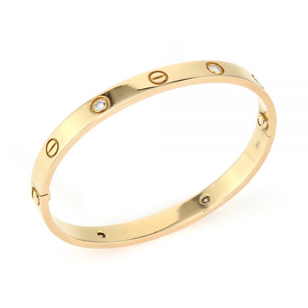 Cartier 18ct Rose Gold Love Bangle Bracelet set with four brilliant cut diamonds, Circa 2000s. Comes with Cartier box, gold screwdriver and certificate / insurance valuation from Cartier in Harrods London