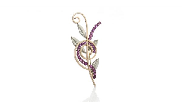 Tiffany and Co Vintage Ruby and Diamond Retro Floral Brooch, crafted from platinum and 14ct yellow gold, set with rubies and diamonds. USA, Circa 1940s