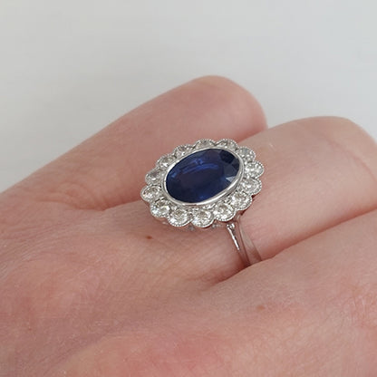 2.57ct Sapphire and Diamond Oval Cluster Engagement Ring