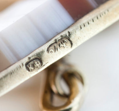 Faberge Antique Russian Agate and Silver Cufflinks; pair of late 19th century Fabergé rectangular silver cufflinks set with agate. Circa 1890s