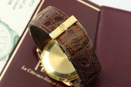 Piaget Triple Calendar Moon Phase 18ct Yellow Gold Limited Edition 33mm Watch, white dial, on brown leather strap with 18ct gold Piaget buckle. Ref. 15908, with Papers