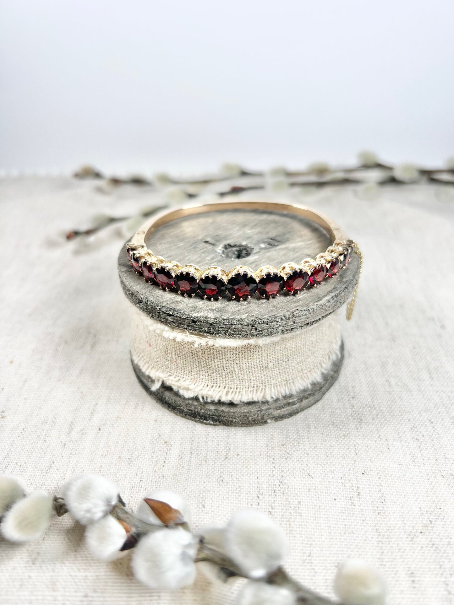 Antique Edwardian 14 Carat Gold Faceted Garnet Bangle Bracelet, Circa 1900