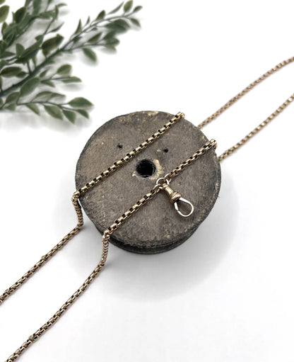 A long rose gold link necklace with swivel clasp