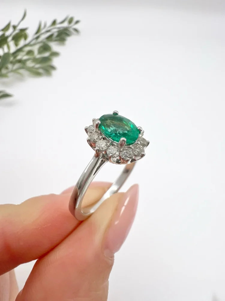 Emerald And Diamond Cluster Ring In 18 Carat White Gold