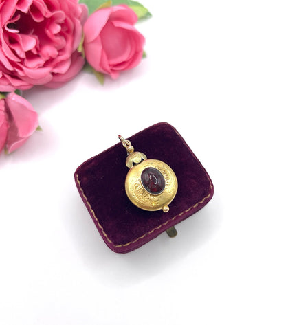 Victorian 15 Carat Two-Colour Gold Cabochon Garnet Locket Back Pendant, Circa 1870