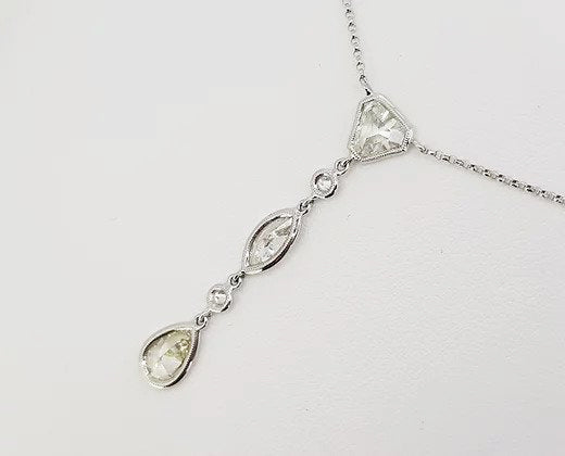 Triple Diamond Drop Pendant, 2.67 carat total, 18ct white gold.