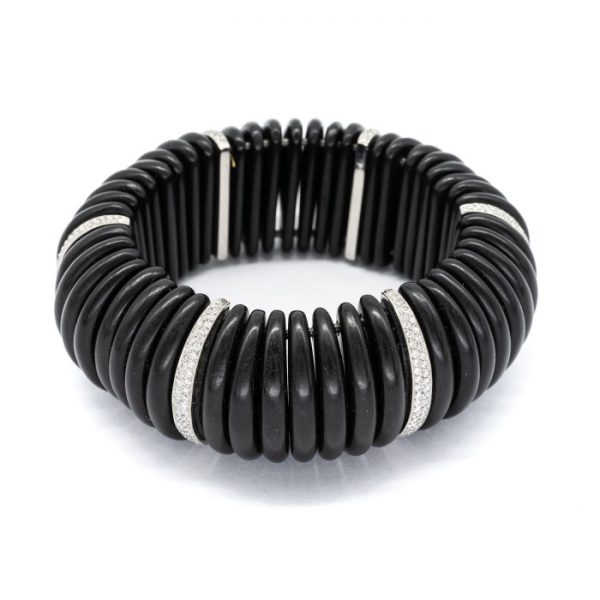 Ebony Diamond and Platinum Expandable Cuff Bracelet; ebony segments spaced by graduated diamond links pavé set in platinum, 2.75 carat total