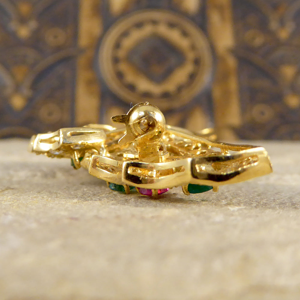 Contemporary diamond emerald ruby and sapphire butterfly brooch in 18ct gold
