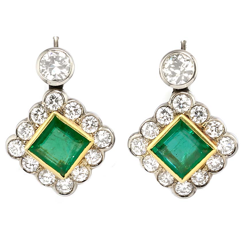 Art Deco 3.54ct Colombian Emerald and 5.75ct Diamond Cluster Drop Earrings, 3.54cts square-shaped step-cut Colombian emeralds surrounded by early brilliant-cut diamonds suspended from old European-cut diamond solitaire tops in 18ct gold. Circa 1935