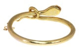Antique Victorian Diamond, Ruby and 18ct Yellow Gold Snake Bangle Bracelet; twelve rose-cut diamond set head, with ruby set eyes, Circa 1880
