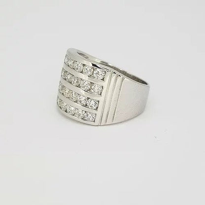 Channel Set Diamond Dress Ring; featuring four horizontal rows channel set with 2.00 carats brilliant cut diamonds, ribbed shoulders, in 18ct white gold