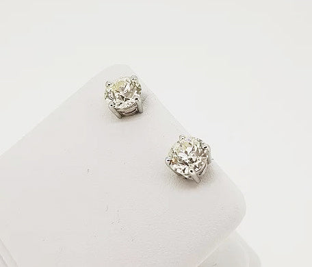 Pair of Diamond Solitaire Stud Earrings; 2.86 carat total, round brilliant-cut diamonds, four-claw set, in 18ct white gold, G/H colour, VS2 clarity.