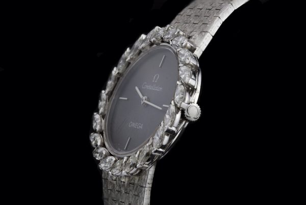 Vintage Omega Ladies 18ct White Gold and Diamond Set Manual Watch; ref 8195, with marquise-cut diamond set bezel, 1.00 carat total, in Omega box, Circa 1980s
