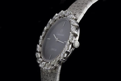 Vintage Omega Ladies 18ct White Gold and Diamond Set Manual Watch; ref 8195, with marquise-cut diamond set bezel, 1.00 carat total, in Omega box, Circa 1980s