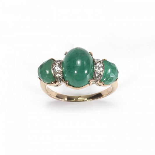 Vintage Cabochon Emerald and Diamond Three Stone Ring; central 2.80ct cabochon-cut emerald, flanked by fancy faceted emeralds and round brilliant-cut diamonds, claw set in yellow gold. Circa 1950