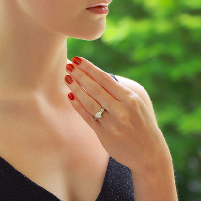 1.15ct Heart Cut Solitaire Diamond Engagement Ring with Princess Cut Diamond Shoulders in Platinum