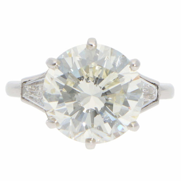 Vintage 6.03 Carat GIA Certified Diamond Three Stone Ring In Platinum